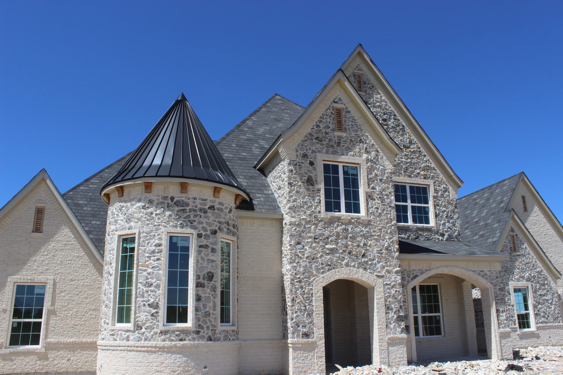 Custom home with a complex shingle roof, Royal Crest project