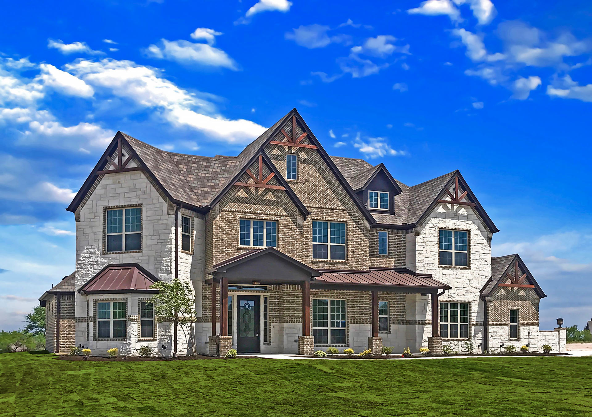 Elevated view of a large custom home roof, Royal Crest project